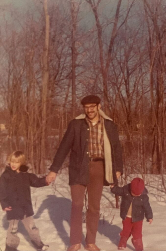 Joseph Bruchac at the edge of the Splinterville Hill woods with his sons James and Jesse (1974). Photograph by Carol Bruchac.