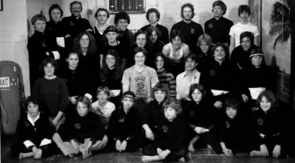 1979 Pentjak Class. Joseph Bruchac is in the back row, his two sons, James and Jesse are seated in the front row.